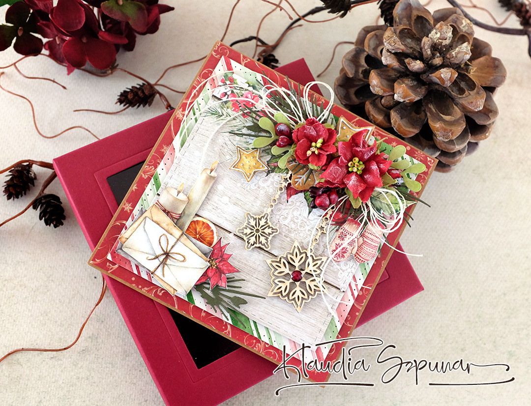 Handgemachte Weihnachtskarte mit roten Blumen und Kerze